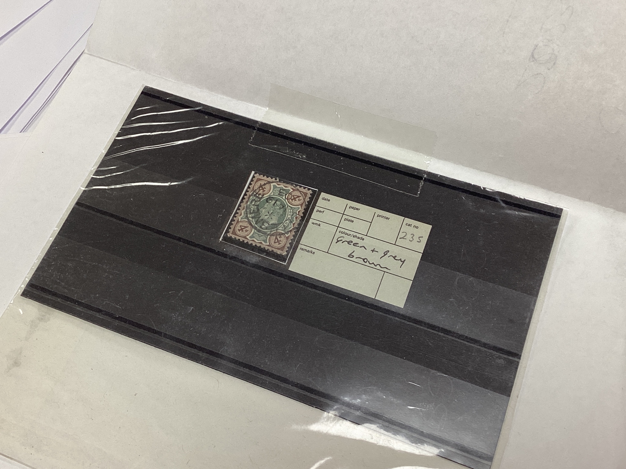 Great Britain Edward VII stamps in auction folders with 9d-10d-one shilling, mint, officials mint and used